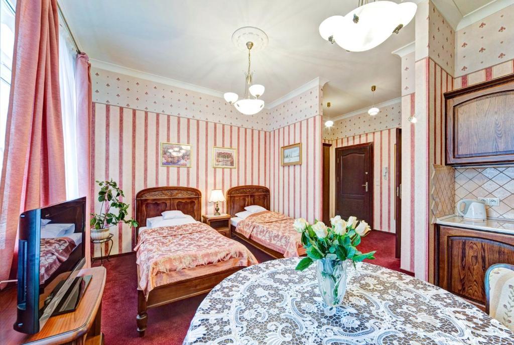 ポズナンアパルタメンティー レトロアパートメント 部屋 写真
